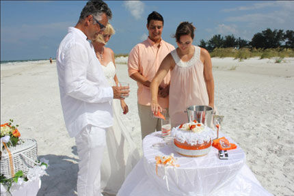 Beach wedding sand unity ceremony in Sarasota Florida